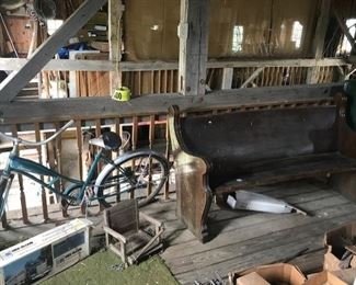 Murray tank bike, oak church pew, child swing, and there are cool sleds next to this but not in shot