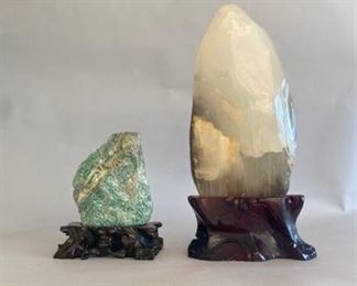 Two Asian Stone Decorations On Stands