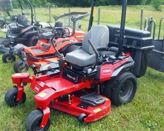 Toro Titan HD 2000 Series Gas Powered Zero Turn Mower With 60" Deck And EZ Vac Bag Clipping System, 27 Hours Showing