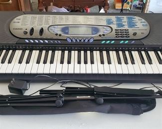 Casio Electric Keyboard, Model CTK-571 And Collapsable Music Stand
