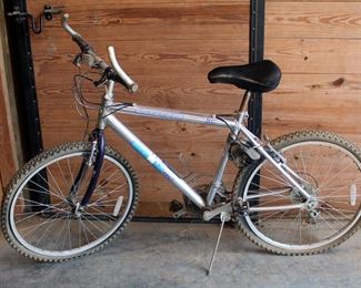 Huffy Iron Man Triathlon Pro Aluminum Framed Bicycle With 21 Speed Index, And FS Elite Kensington Sport Recreation Bicycle, 15 Speed Grip Shift