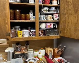 Kitchen; mugs, flatware, knives, glassware