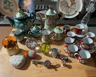 nice assortment of tea cups / pots