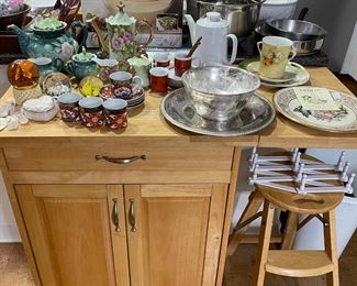 butcher block on wheels, fold down leaf.