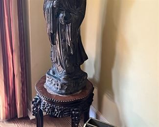 Fine antique Asian statue on rosewood stand