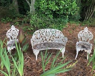 heavy cast iron settee and chairs