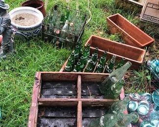 old coke and sprite bottles, crates