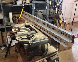 old Craftsman table saw, cheese cutter, fishing poles
