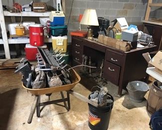 old desk, 2 sets of gas logs, coolers, etc.