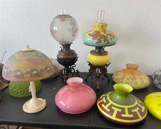 Many fantastic antique and vintage lamp shades, including Tam O Shanter, a potential Handel shade, a gold hand painted fleur de lis yellow glass shade, Asian Chinese dragon or lion design shades, punched brass, reverse painted, and an amazing geometric pattern shade. 