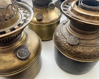 Amazing collection of antique kerosene lamp bases and parts from quality makers like B&H (Bradley and Hubbard)