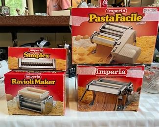 Pasta maker, pasta maker motor, ravioli maker, spaghetti attachment- each with the box. All in gently used or better condition!
