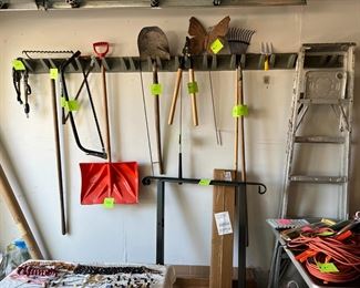 Shovel, rake, new railing, saw, painting ladder, extension cords, among other garden tools