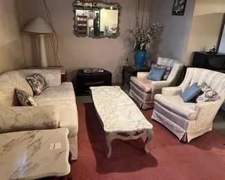 Couch with two arm chairs, marble top coffee table, large mirror, floor lamp, set of 2 marble top end tables