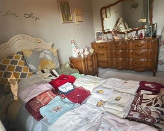 Twin-sized bed, frame, and headboard. Decorative and bath towels