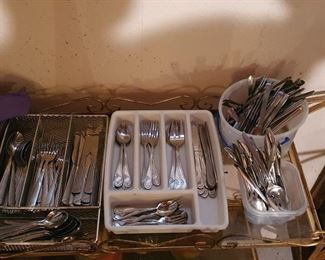 Seven sets of vintage silverware
