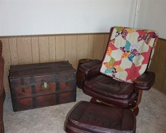 Chair and ottoman, quilt, trunk