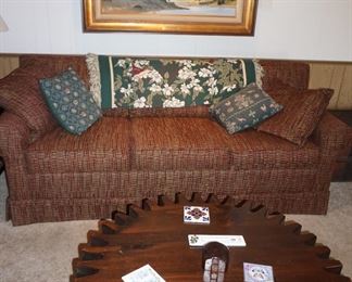 sofa, rotating coffee table,