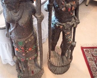 The statues are around 3 ft high and jeweled.