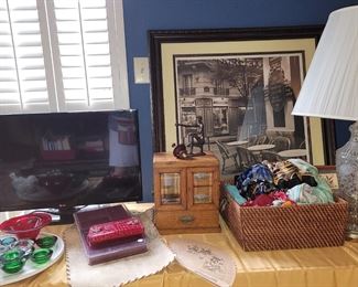 Silk scarves, candle holders, silk scarves, small TV
