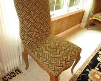 Item 4: Cellura Designs French Country-style pine trestle dining table with herringbone parquetry top, one 2’ leaf, and (8) side chairs. Table without the 2’ leaf measures 6’2” long x 42” wide x 29” tall. Each chair measures 21” wide x 23.5” deep x 42” tall. PRICE: $2,995