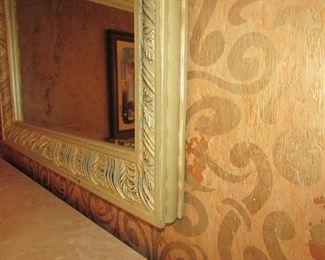 Item 6: Ornate beveled mirror with painted wooden and resin frame. Stamped “Made in USA” to back. Has hooks on back to hang either way. 49” long x 38” tall. Frame is 2.75” thick. PRICE: $250.00