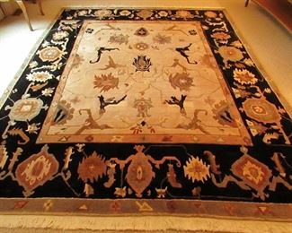 Item 7: Tufenkian hand knotted wool Tibetan carpet. 10’ 4” long (including fringe) x 8’ wide. PRICE: $1,200.00