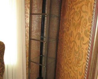 Item 8: Ornate metal and glass étagère (with wooden bottom panel). Has three glass shelves. 77” tall x 16” deep x 17.5” at widest points. PRICE: $650.00