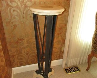 Item 9: Tessellated marble and patinated metal pedestal. “Made in Philippines” label to underside. 41.5” tall x 14” diameter at top. PRICE: $225.00