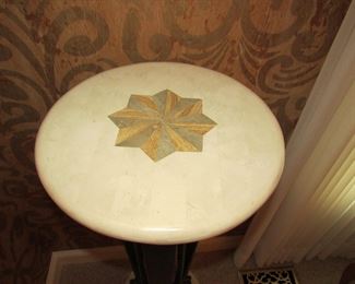 Item 9: Tessellated marble and patinated metal pedestal. “Made in Philippines” label to underside. 41.5” tall x 14” diameter at top. PRICE: $225.00