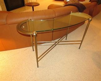 Item 11: Contemporary metal and glass console / sofa table. Kidney shaped. 54” long x 19.5” wide x 29.5” at tallest point. PRICE: $225.00