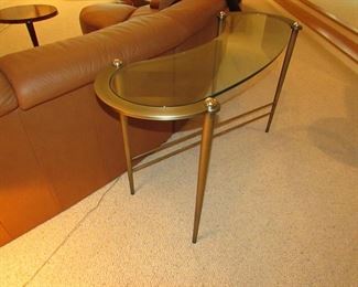 Item 11: Contemporary metal and glass console / sofa table. Kidney shaped. 54” long x 19.5” wide x 29.5” at tallest point. PRICE: $225.00