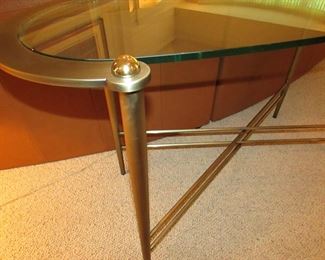 Item 11: Contemporary metal and glass console / sofa table. Kidney shaped. 54” long x 19.5” wide x 29.5” at tallest point. PRICE: $225.00