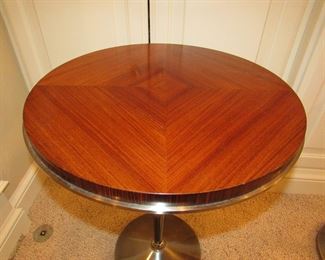 Item 14: Another Contemporary wooden and metal accent table with brushed nickel finish to metal. Brand name not found. 2’ tall x 18.5” diameter. PRICE: $195.00