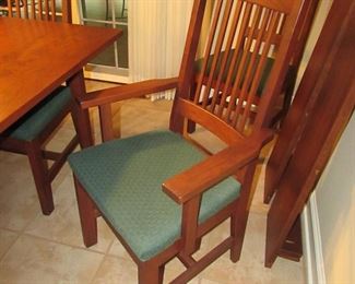 Item 15: L. & Sons Woodshop of Apple Creek, Ohio cherry Mission-style dining table with (8) chairs. (six side chairs and two arm chairs). Also with (2) leaves that are each 1’ wide. Table without leaves is 5’ long x 42” wide x 30” tall. PRICE: $1,200.00