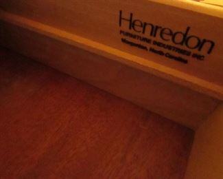 Item 24: Henredon blonde oak campaign style 7-drawer dresser with mirror. Dresser measures 6’ long x 18” deep x 28” tall. Mirror measures 49” long x 34” wide. PRICE: $550.00