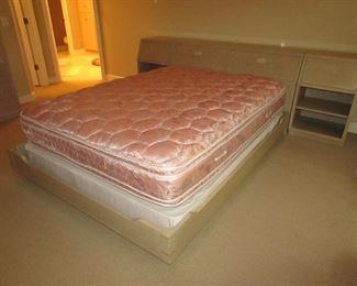 Item 26: Henredon queen bed with (2) matching night stands that fit against the sides of the headboard. Storage inside the headboard. Headboard alone measures 64” wide x 18” deep x 34” tall. Each flush fitting night stand measures 22” wide. Overall length of headboard with nightstands is 9’. PRICE: $750.00