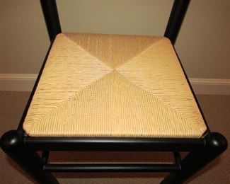 Item 32: Black painted side chair with woven seat. No makers mark found. Measures 32” tall x 17” wide x 16” deep. PRICE: $125.00