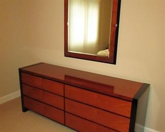 Item 33: Henredon 6-drawer dresser with mirror. 71” long x 28.5” tall x 19” deep. Mirror measures 34” wide x 47.5” long. PRICE: $750.00