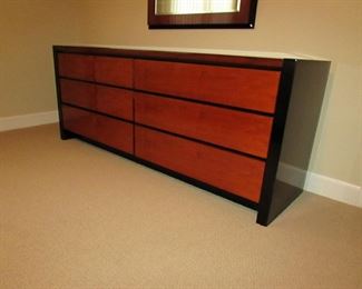 Item 33: Henredon 6-drawer dresser with mirror. 71” long x 28.5” tall x 19” deep. Mirror measures 34” wide x 47.5” long. PRICE: $750.00