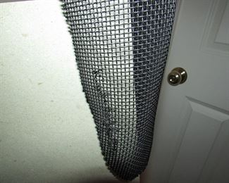 Item 39: Randy Cooper original signed mesh wire sculpture. “Kimberleigh.” On stand. 61” tall (with stand) x 16” wide (at widest point). Body of sculpture measures 34” tall (without stand). PRICE: $750.00