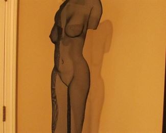 Item 39: Randy Cooper original signed mesh wire sculpture. “Kimberleigh.” On stand. 61” tall (with stand) x 16” wide (at widest point). Body of sculpture measures 34” tall (without stand). PRICE: $750.00