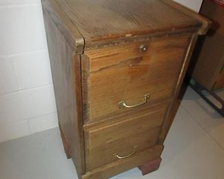 Item 64: Wooden 2-drawer file cabinet. No key. PRICE: $20.00