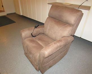 Item 57: Viva Lift upholstered power lifting recliner. Purchased in 2018 and very lightly used. 33” wide a 40.5” tall x 41” deep. PRICE: $595.00