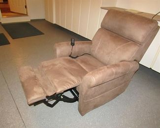 Item 57: Viva Lift upholstered power lifting recliner. Purchased in 2018 and very lightly used. 33” wide a 40.5” tall x 41” deep. PRICE: $595.00