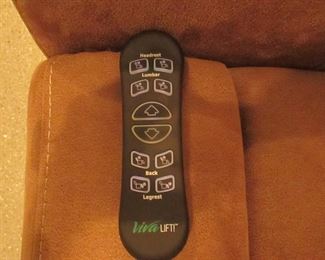 Item 57: Viva Lift upholstered power lifting recliner. Purchased in 2018 and very lightly used. 33” wide a 40.5” tall x 41” deep. PRICE: $595.00