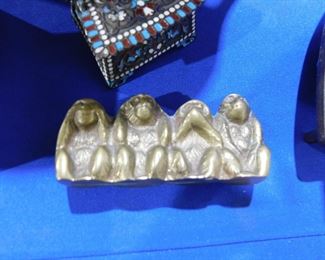 Hear no evil brass figurine
