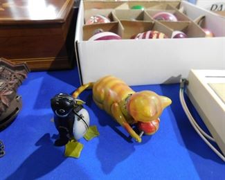 Wind up toy penguin and cat