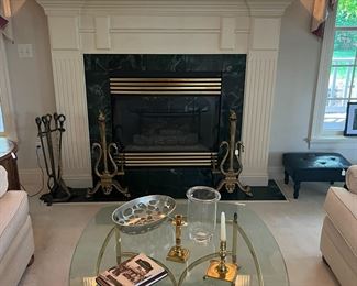 Contemporary glass top and brass coffee table
