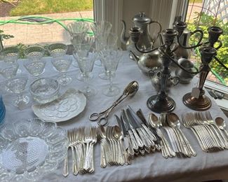 vintage silverplate flatware and part of a large assortment of Waterford crystal